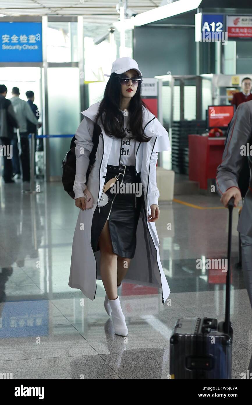 Chinese actress Fan Bingbing arrives at the Beijing Capital International Airport in Beijing, China, 27 March 2018.   Backpack: Louis Vuitton  Handbag Stock Photo