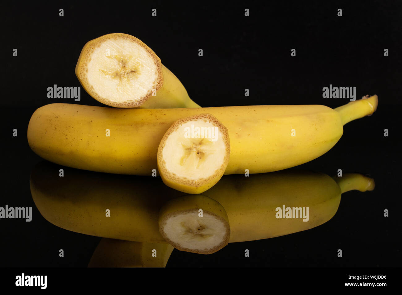 Group of one whole one half one slice of ripe yellow banana isolated on ...