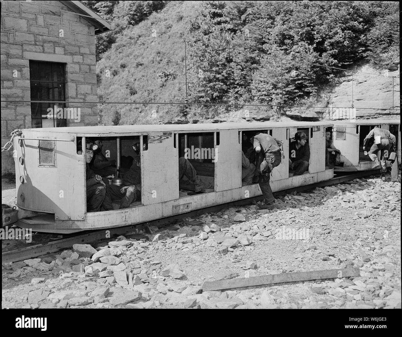 Miners boarding cars of man trip just before going underground on afternoon shift. Koppers Coal Division, Kopperston Mines, Kopperston, Wyoming County, West Virginia. Stock Photo
