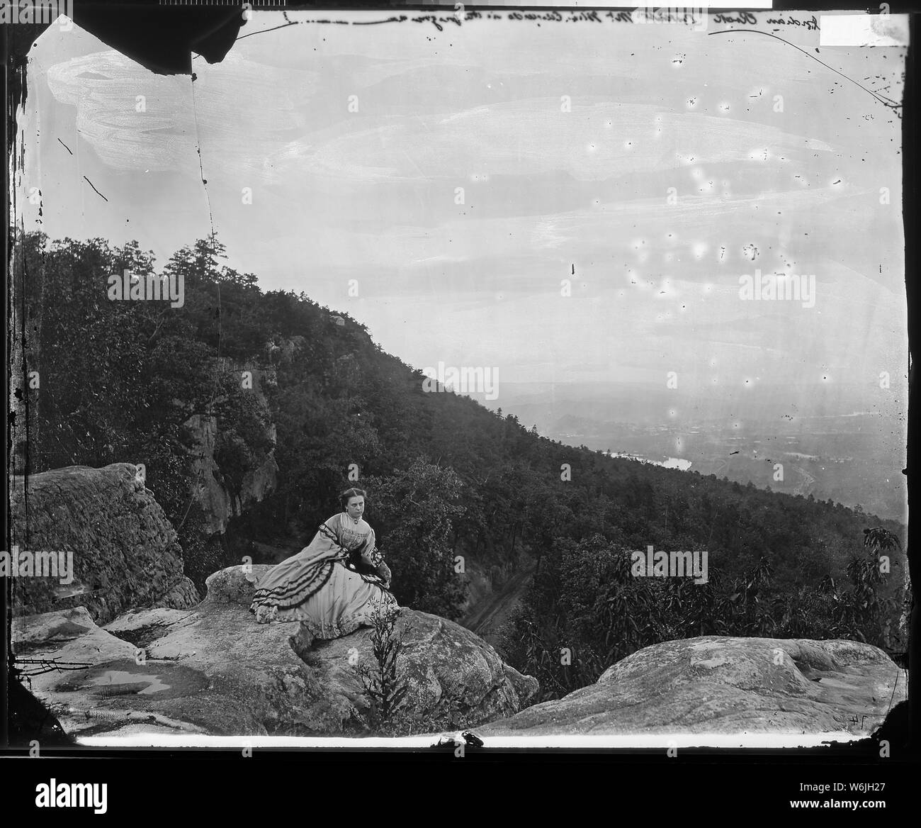 Miss Edwards in front of Indian Rock, Lookout Mountain, Tenn Stock Photo