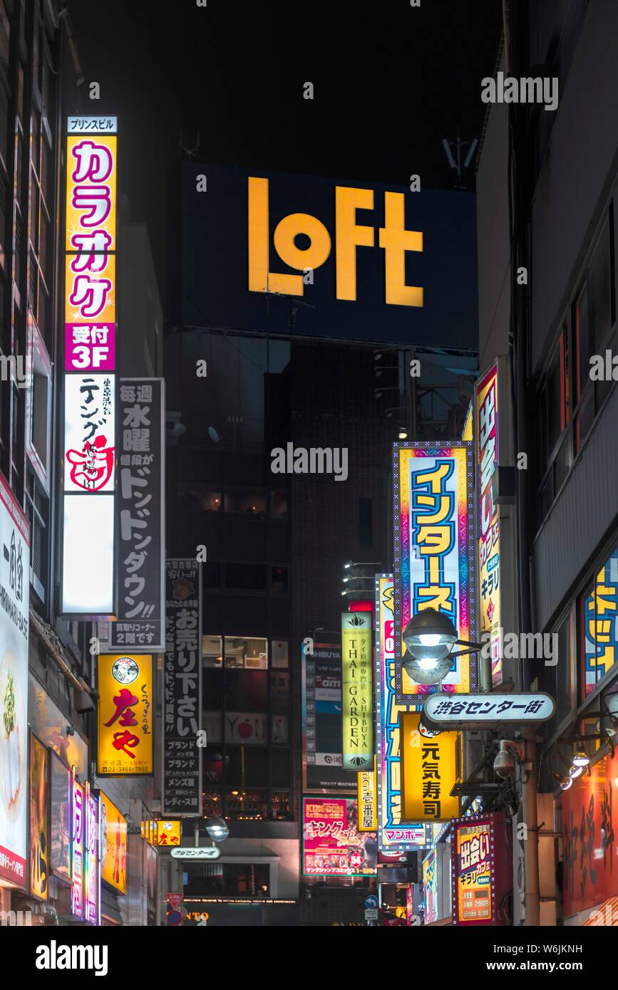 Illuminated advertising and signs at night, Udagawacho, Shibuya, Tokyo, Japan Stock Photo