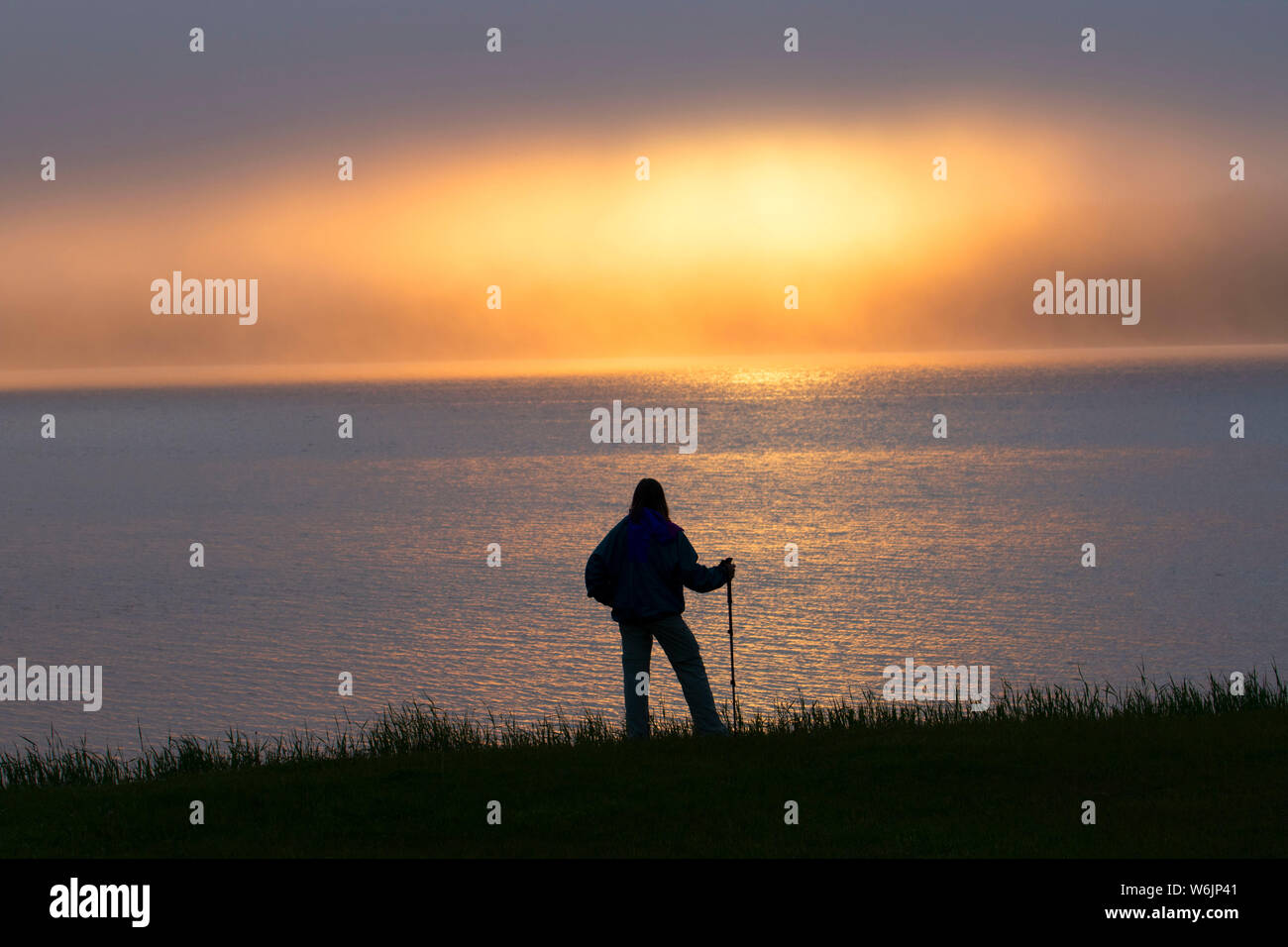 Hiker sunset, Chuff's Bight Park, Sandringham, Newfoundland and ...