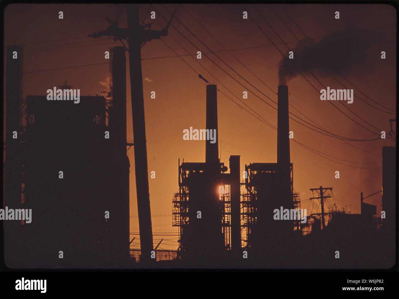 OIL REFINERY IN THE SUNSET Stock Photo - Alamy