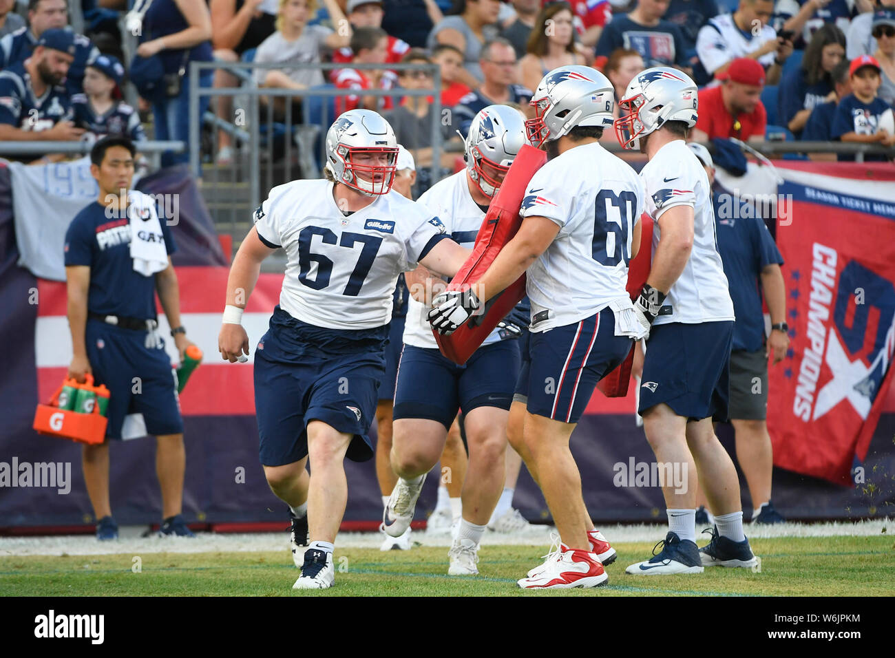 Foxborough, Massachusetts, USA. 29th July, 2019. New England Patriots offensive lineman Tyler Gauthier (67) and center David Andrews (60) at the New England Patriots training camp held at Gillette Stadium, in Foxborough, Massachusetts. Eric Canha/CSM/Alamy Live News Stock Photo