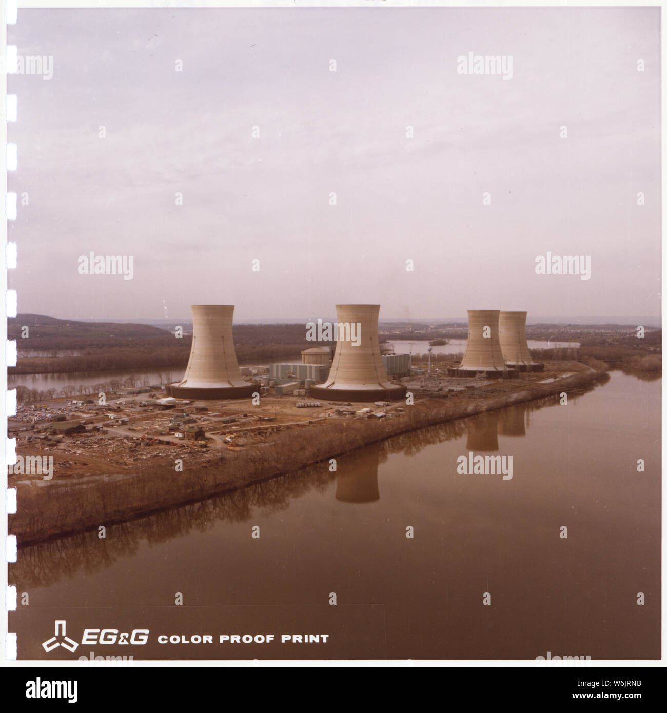 Oblique [view of] TMI [Three Mile Island].; Scope and content:  Three Mile Island Nuclear Generating Station after the March 1979 nuclear accident, reflecting in the Susquehanna River. Stock Photo