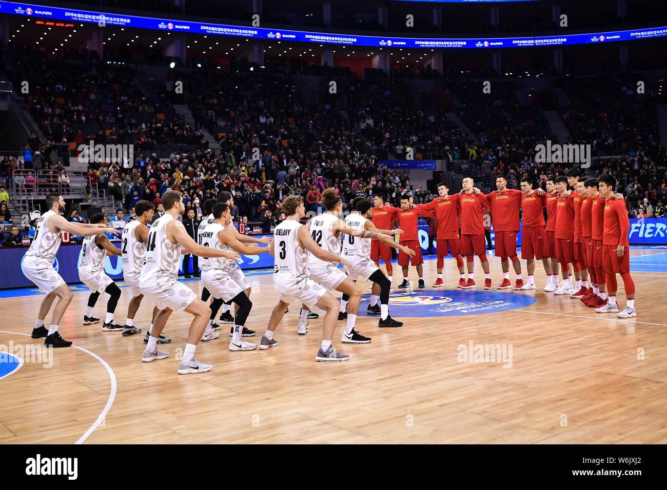 Players of New Zealand perform kiwi haka dance to cheer up in their