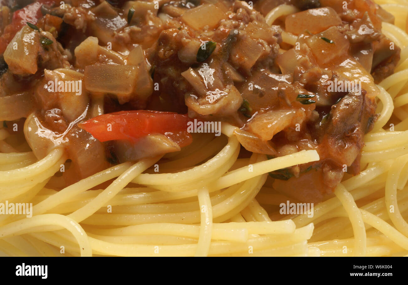 Spaghetti with curry sauce Stock Photo Alamy