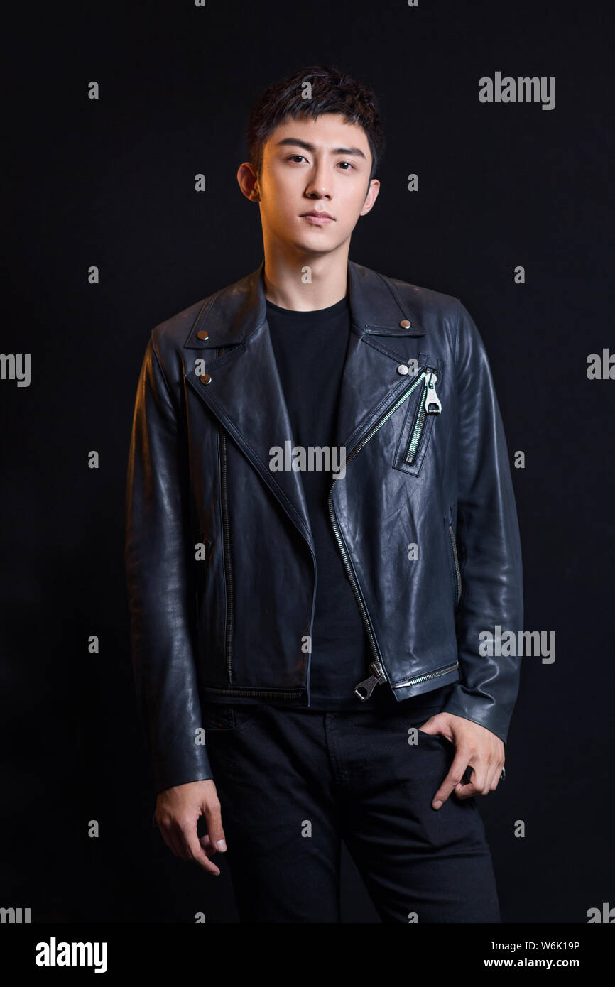 Chinese actor and model Huang Jingyu, also known as Johnny Huang, poses for portrait photos during an exclusive interview by Imaginechina in Beijing, Stock Photo