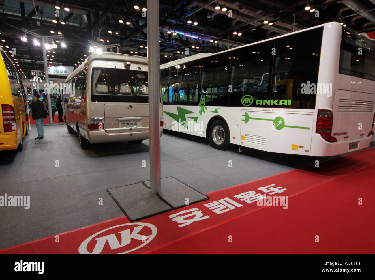 --FILE--Buses are on display at the stand of Anhui Ankai Automobile during an exhibition in Beijing, China, 14 May 2014.   Anhui Ankai Automobile Co. Stock Photo