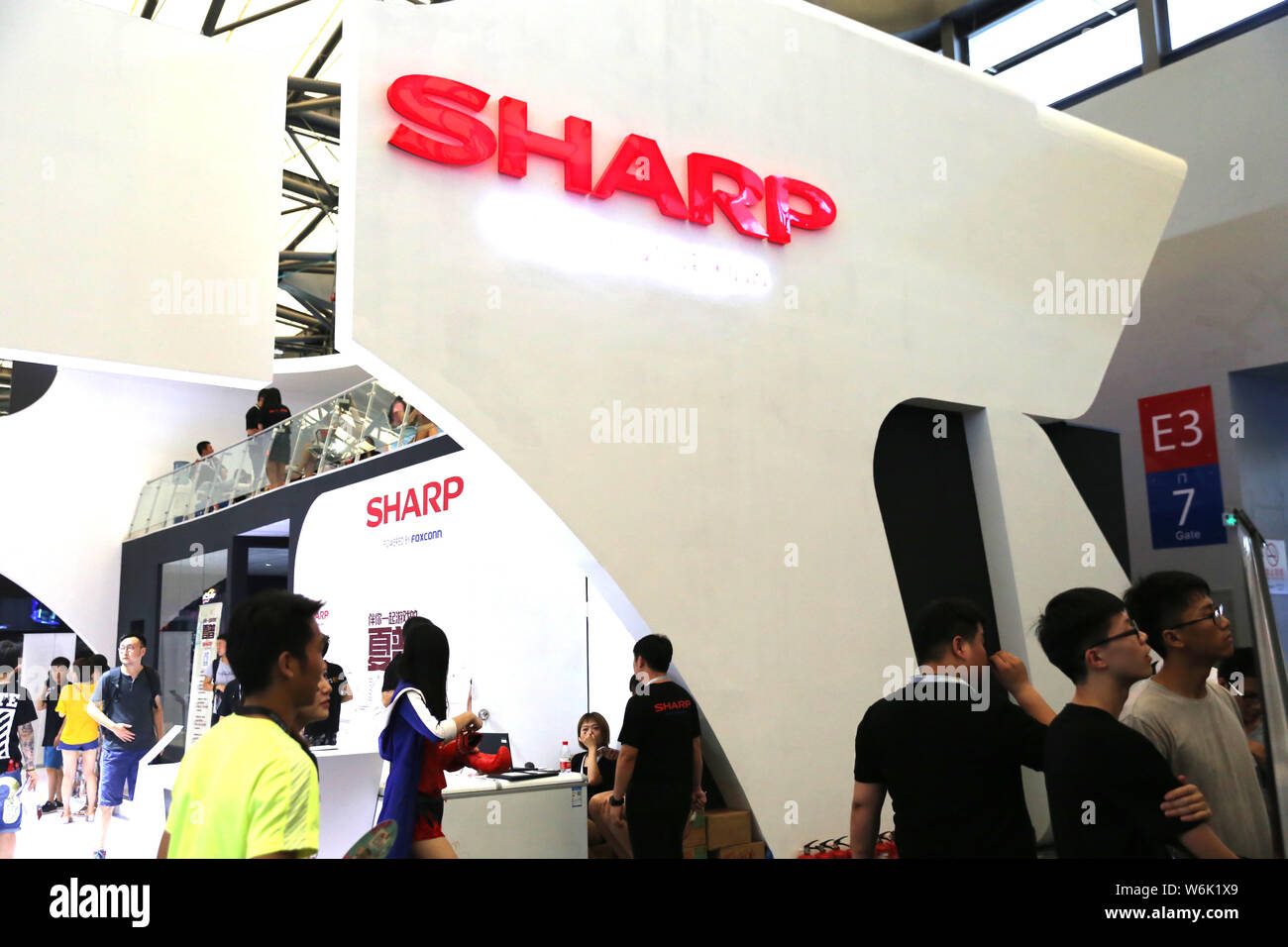 File People Visit The Stand Of Sharp During An Exhibition In