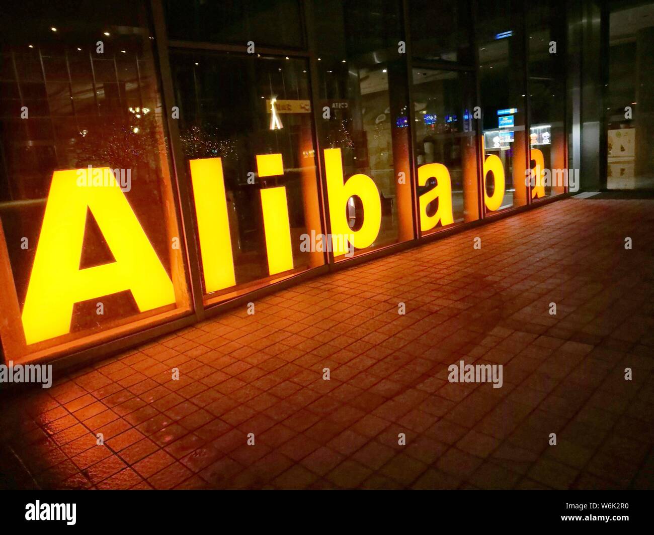 --FILE--A logo of Alibaba Group is pictured in Shenzhen city, south China's Guangdong province, 14 January 2018.   Alibaba's film unit and U.S. produc Stock Photo