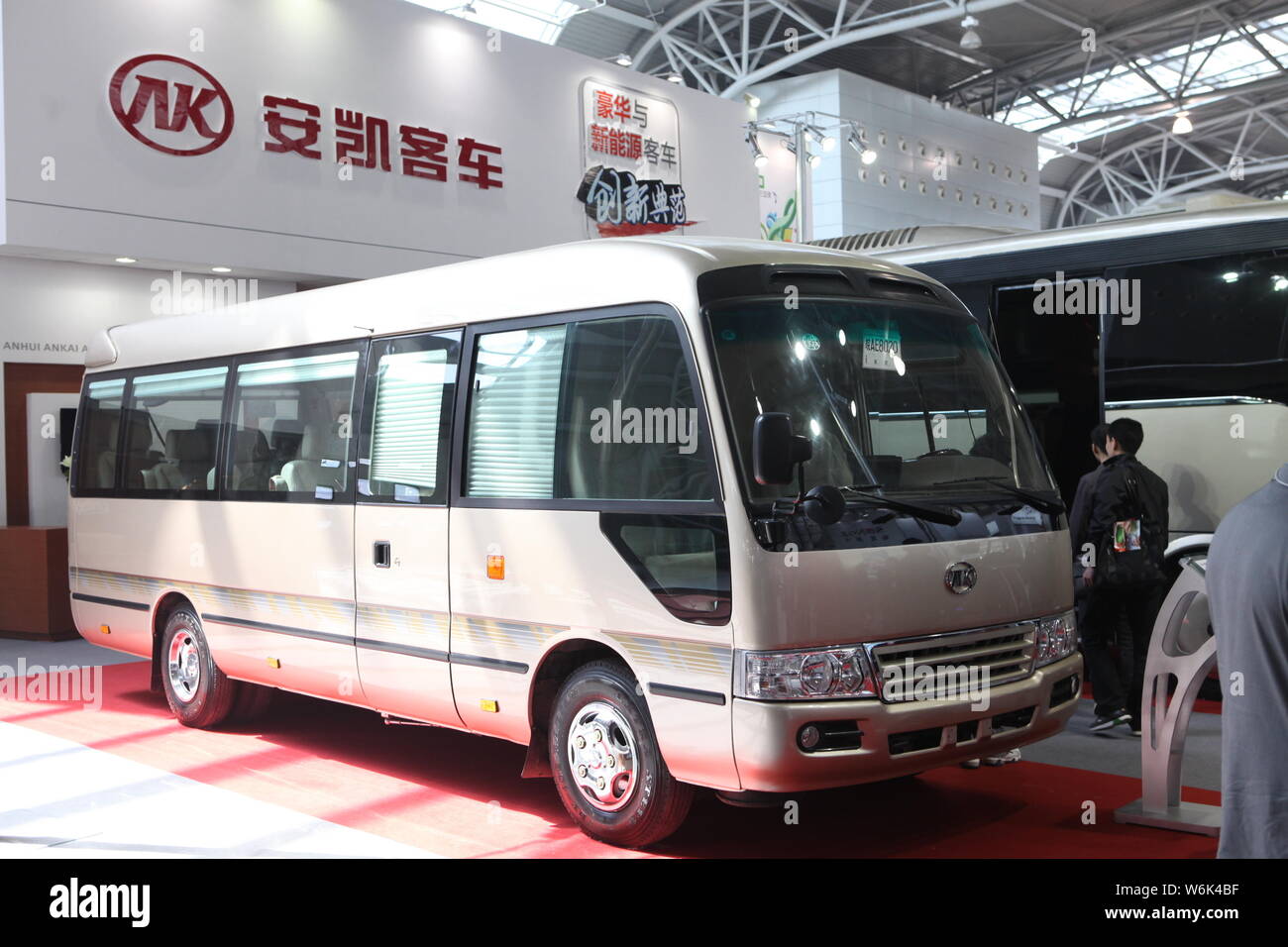 --FILE--A bus is on display at the stand of Anhui Ankai Automobile during an exhibition in Shanghai, China, 6 April 2011.   Anhui Ankai Automobile Co. Stock Photo