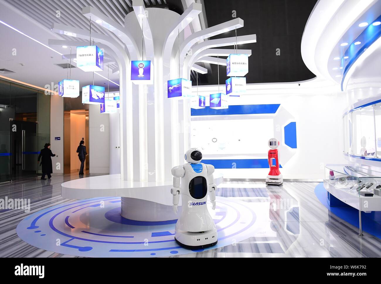 Robots are on display at the headquarters of Siasun Robot & Automation Co.,  Ltd., whose mobile robots "danced" to music with performers in an eight-mi  Stock Photo - Alamy