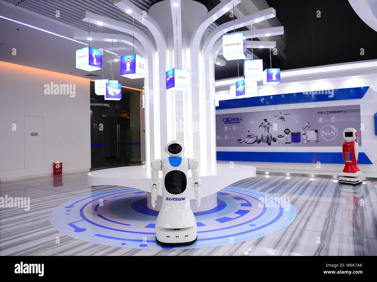 Robots are on display at the headquarters of Siasun Robot & Automation Co.,  Ltd., whose mobile robots "danced" to music with performers in an eight-mi  Stock Photo - Alamy
