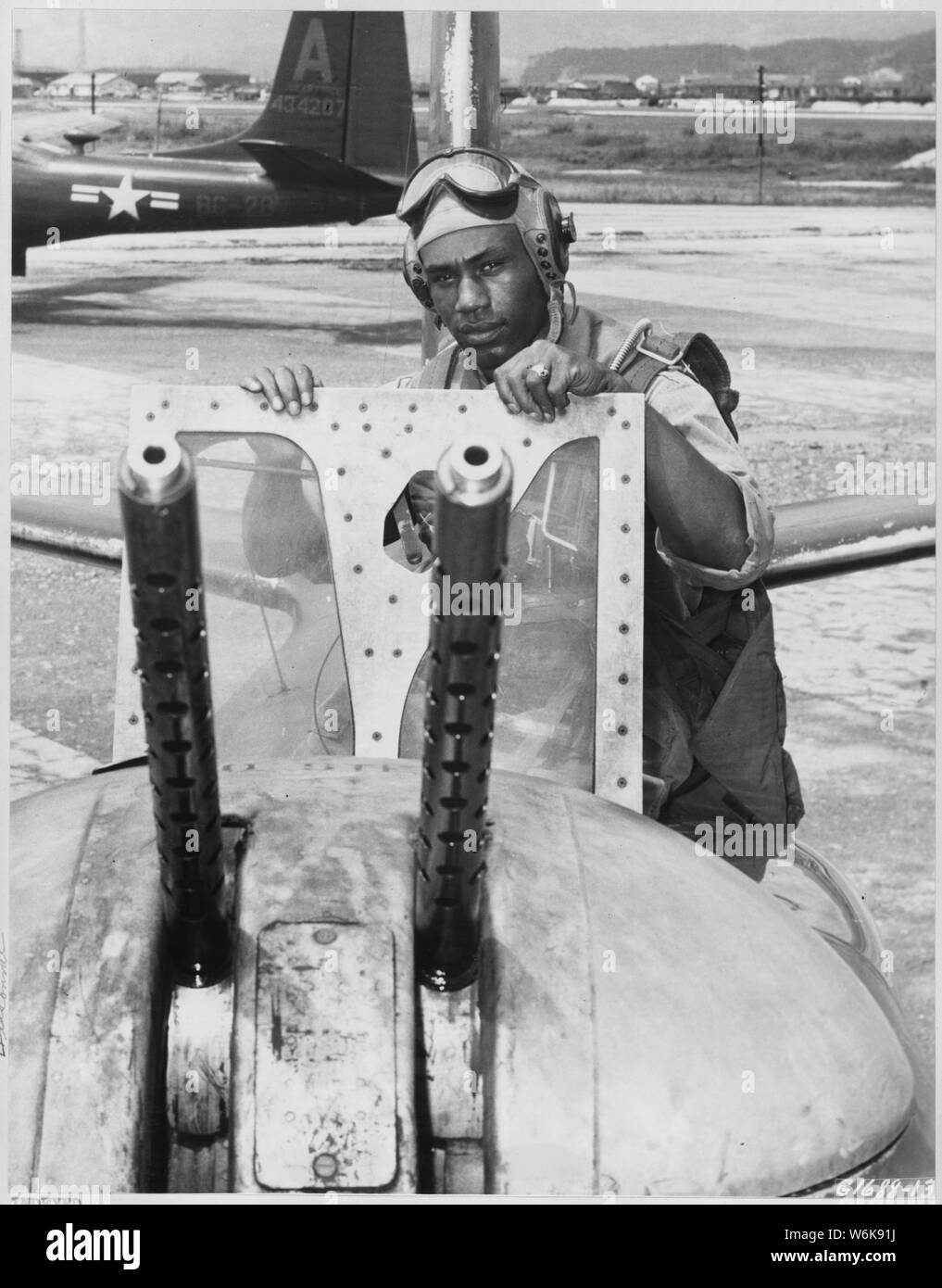 RETURN AT DAWN. T/Sgt. Charles W. Ledbetter, 705 East Stewart Avenue, Columbus, Ohio, is shown as he returned shortly after daybreak from a pre-dawn strike against Communist troop and supply lines. Assigned to the 3rd Bomb Wing, Sgt. Ledbetter has flown 25 night missions as engineer-gunner in Fifth Air Force B-26 light bombers. Stock Photo