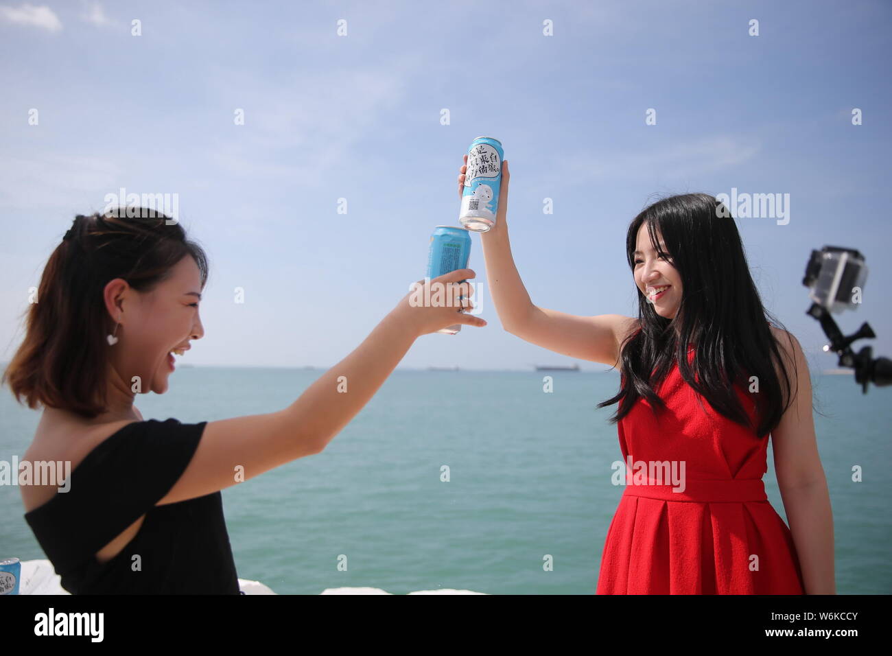 Young Chinese people stage on an artificial floating ice called "Cheers