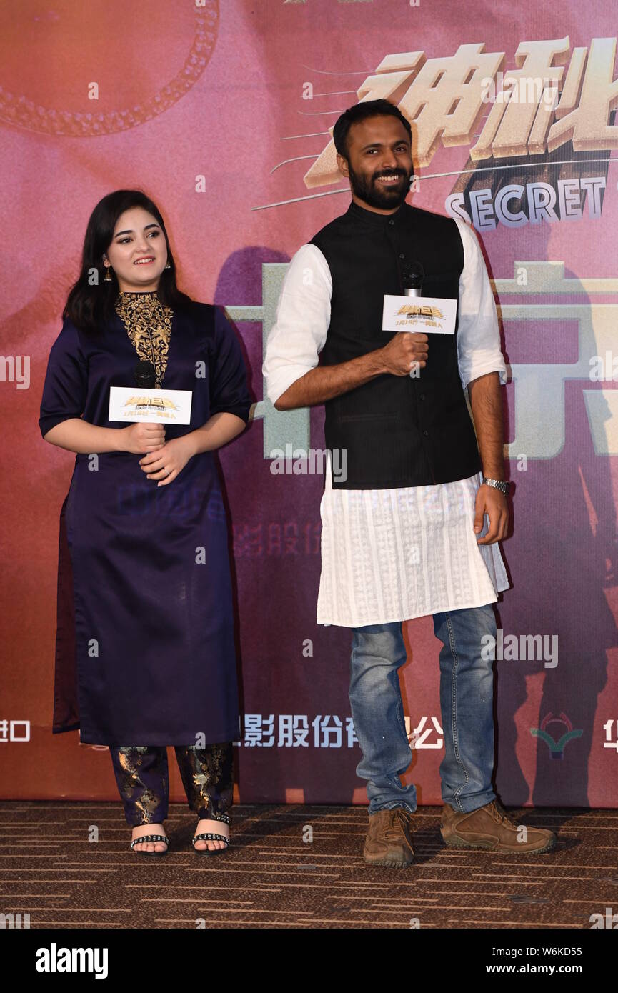 Indian film child actress Zaira Wasim and Indian director Advait Chandan attend a premiere event for the new movie 'Secret Superstar' in Beijing , Chi Stock Photo