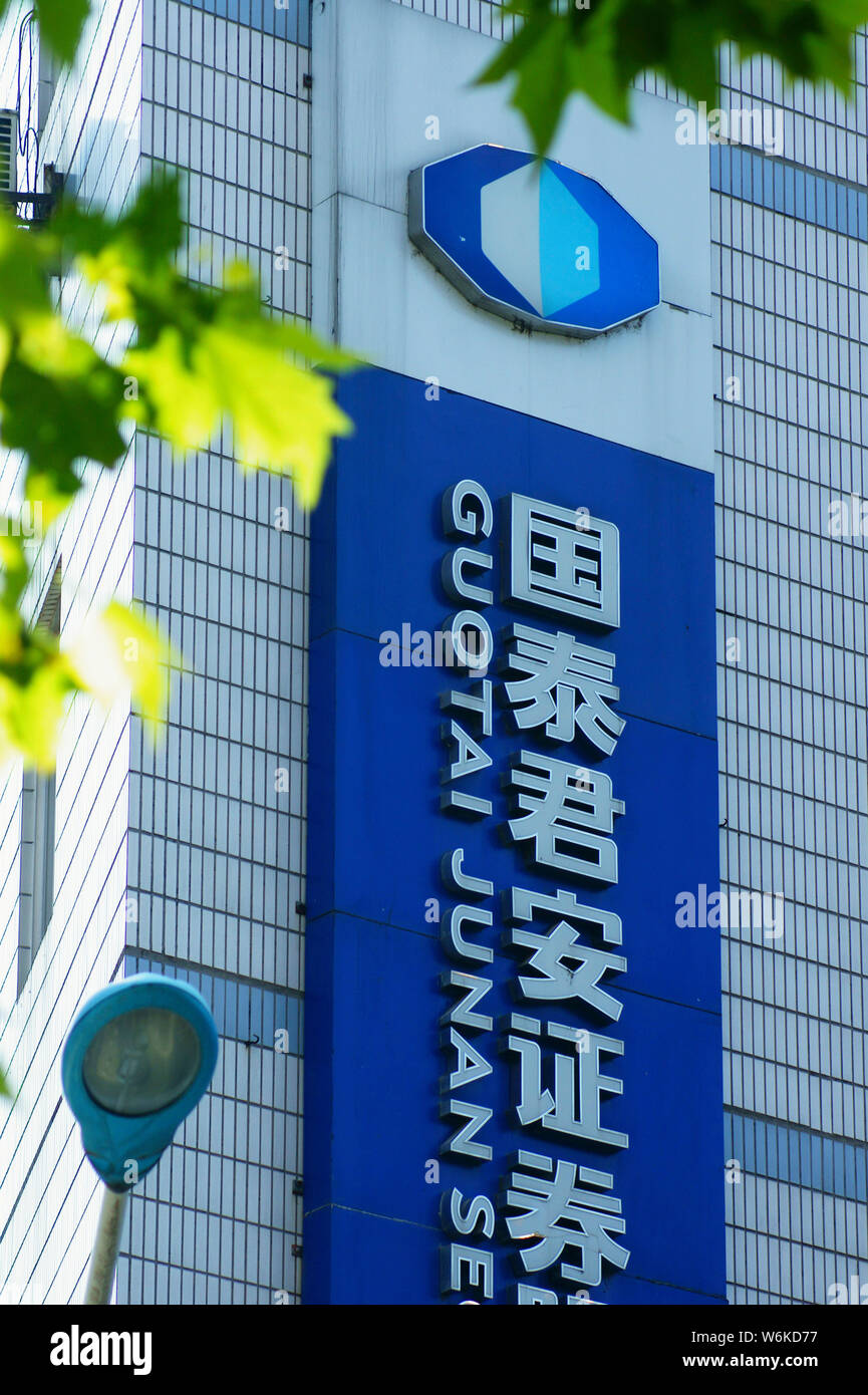 FILE--View of a signboard of Guotai Junan Securities Co., Ltd. in the  Lujiazui Financial District in Pudong, Shanghai, China, 29 June 2017. Guotai  Stock Photo - Alamy
