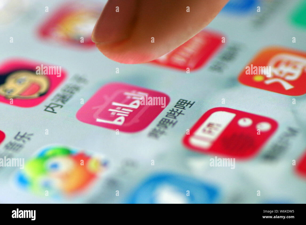 File A Chinese Mobile User Looks At The Icon Of The Mobile App Bilibili A Leading Chinese Video Sharing Streaming Website Themed Around Anime Com Stock Photo Alamy