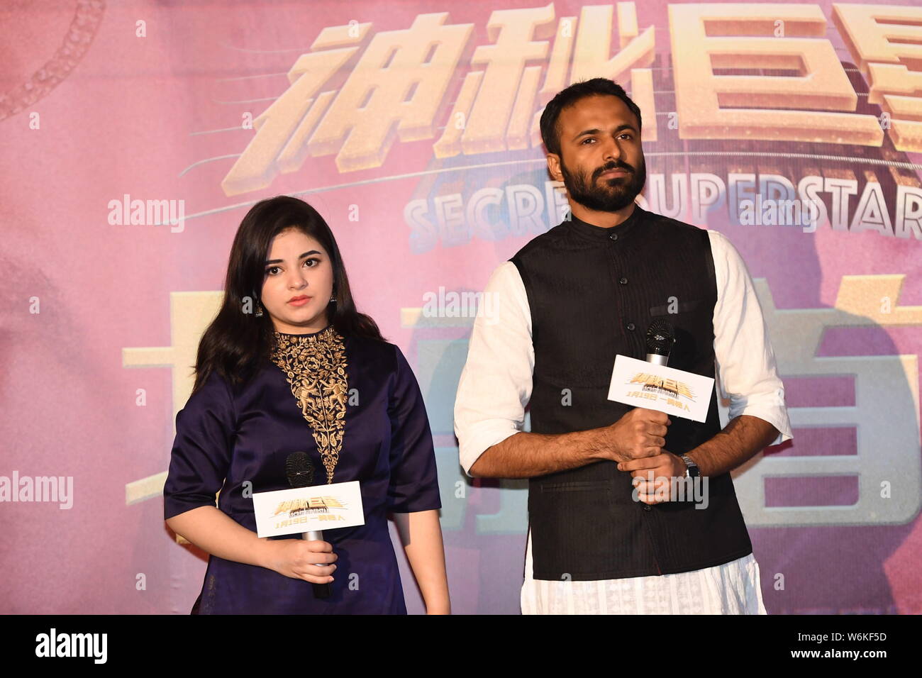 Indian film child actress Zaira Wasim and Indian director Advait Chandan attend a premiere event for the new movie 'Secret Superstar' in Beijing , Chi Stock Photo