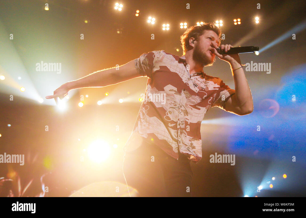 American singer-songwriter Daniel Coulter Reynolds (Dan Reynolds), the lead vocalist of American rock band Imagine Dragons, performs during the band's Stock Photo