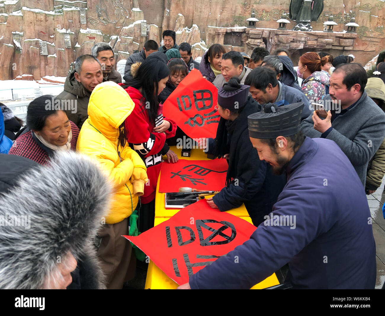 Chinese villagers queue up to get Chinese character