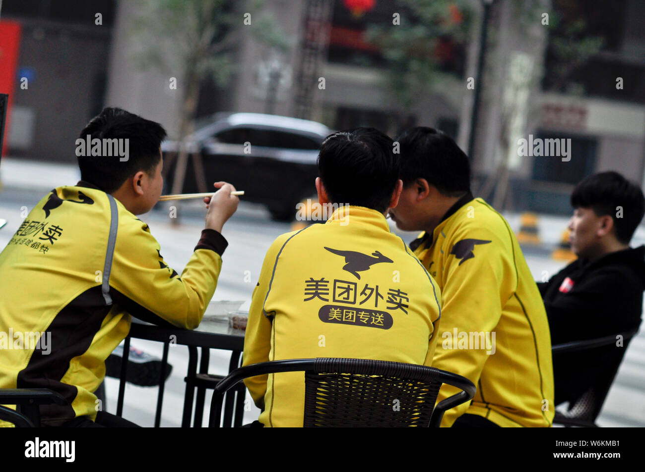FILEDeliverymen of Chinese online food delivery company Meituan