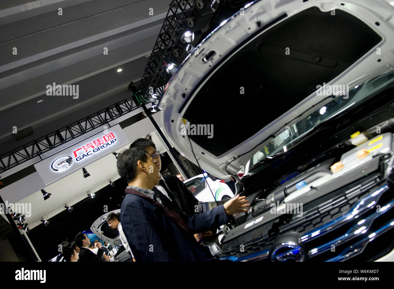 FILEPeople visit the stand of Guangzhou Automobile Group Motor (GAC