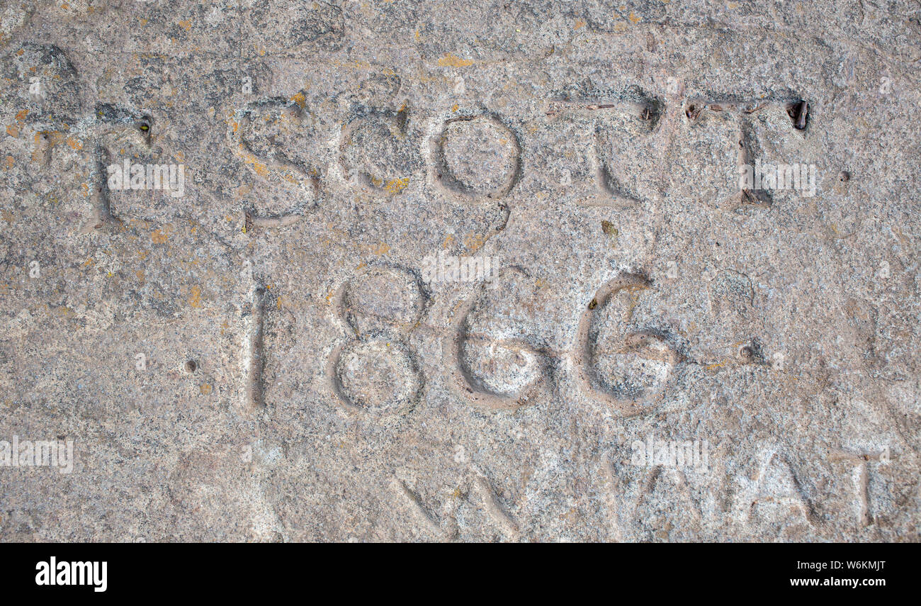 F Scott 1866 inscribed in rocks at the top of Hanging Rock, Victoria, Australia Stock Photo