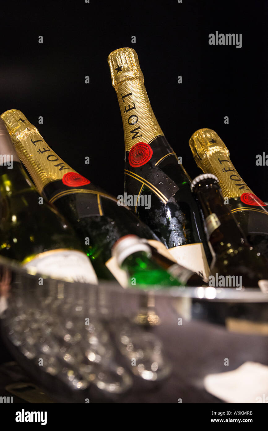 Bottles of Moet Champagne on ice Stock Photo