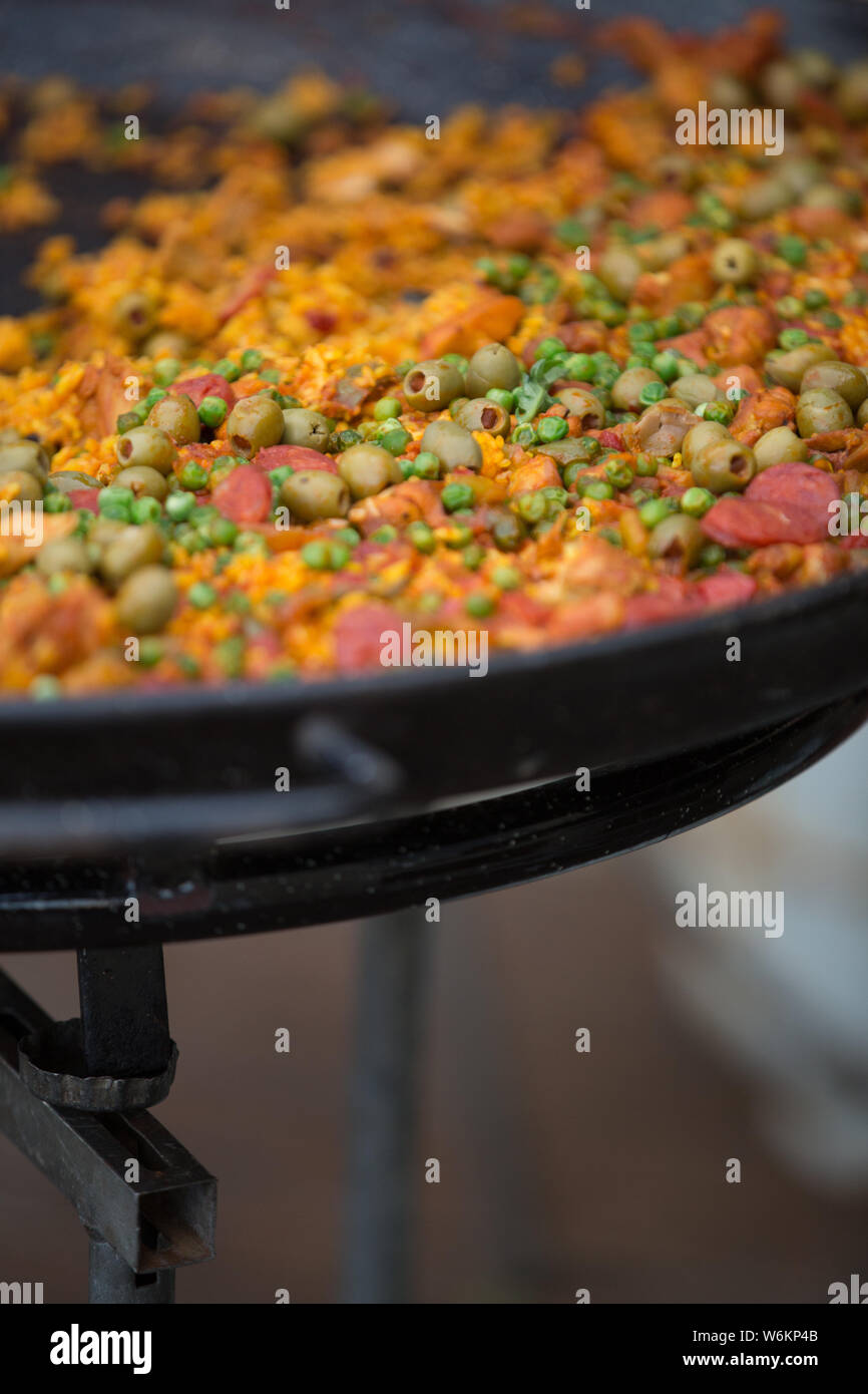 Paella cooking in a pan Stock Photo