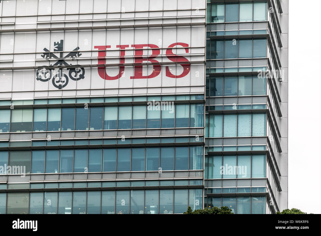 --FILE--A logo of Zurich-based financial services provider UBS Group is pictured on an office building in Shanghai, China, 4 December 2017.   Zurich-b Stock Photo