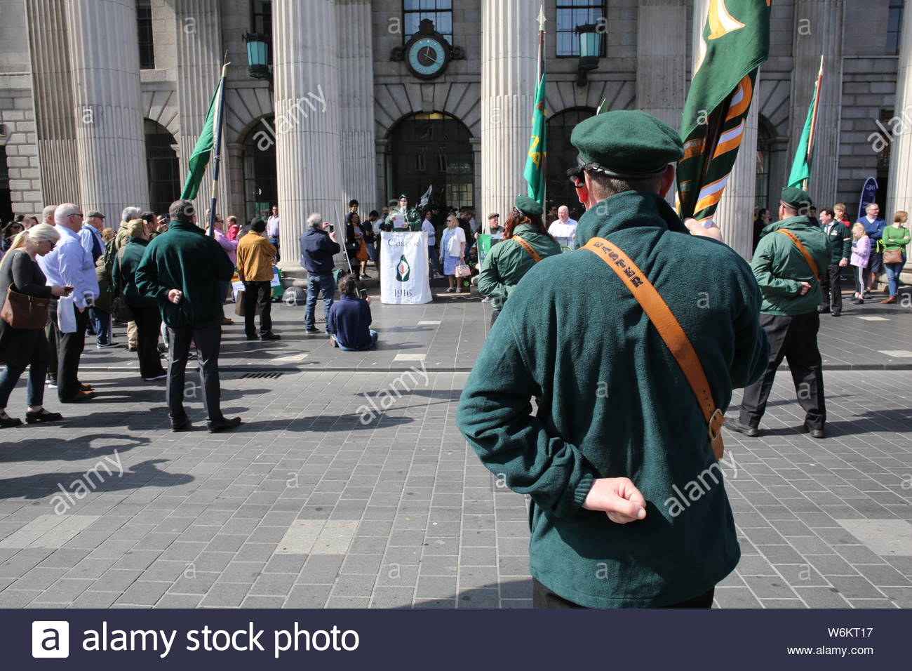 A military parade has taken place in Dublin to commemorate the 1916 Rising. Activists in military style uniform marched through Dublin followed by a s Stock Photo