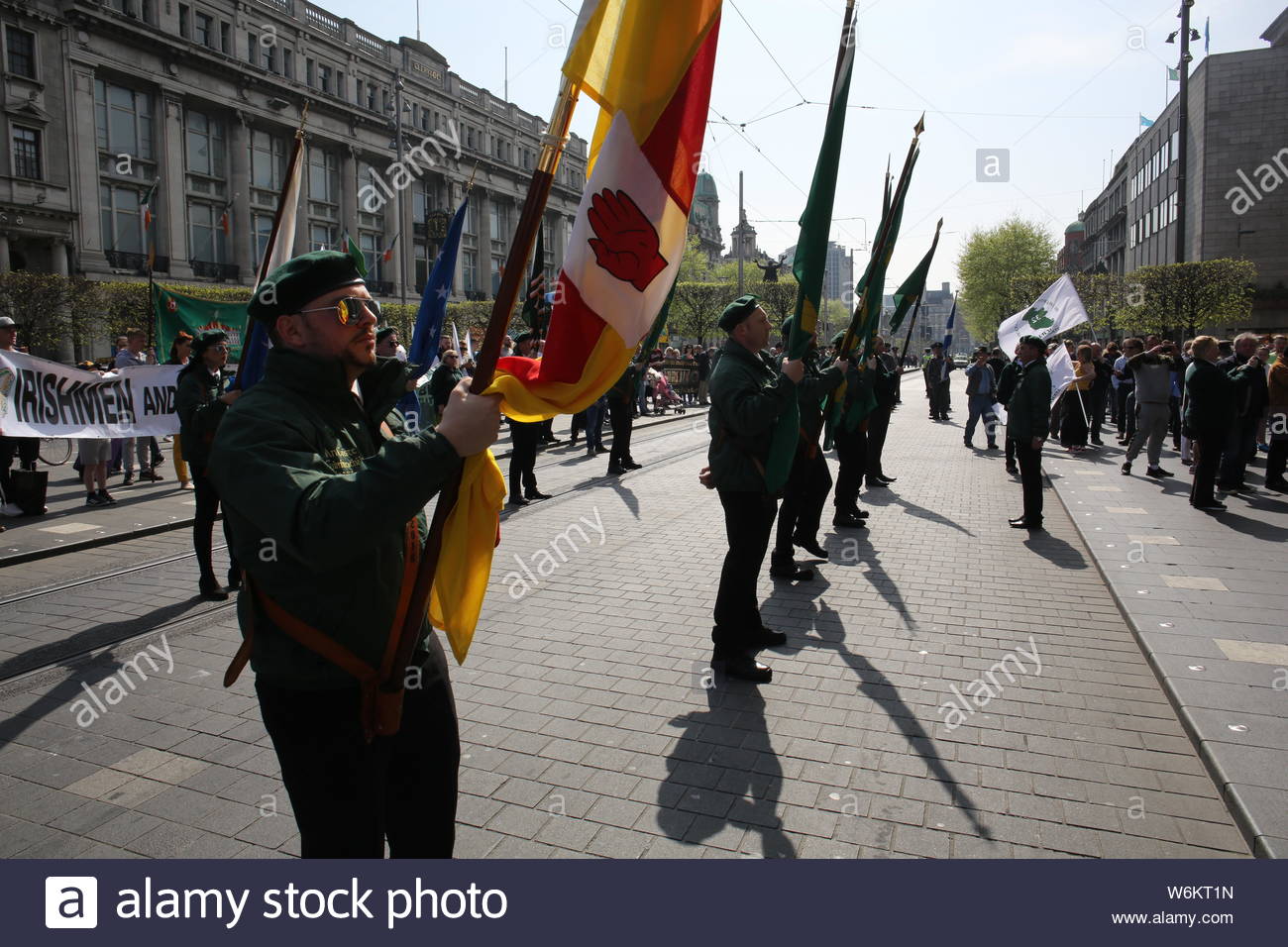 A military parade has taken place in Dublin to commemorate the 1916 Rising. Activists in military style uniform marched through Dublin followed by a s Stock Photo