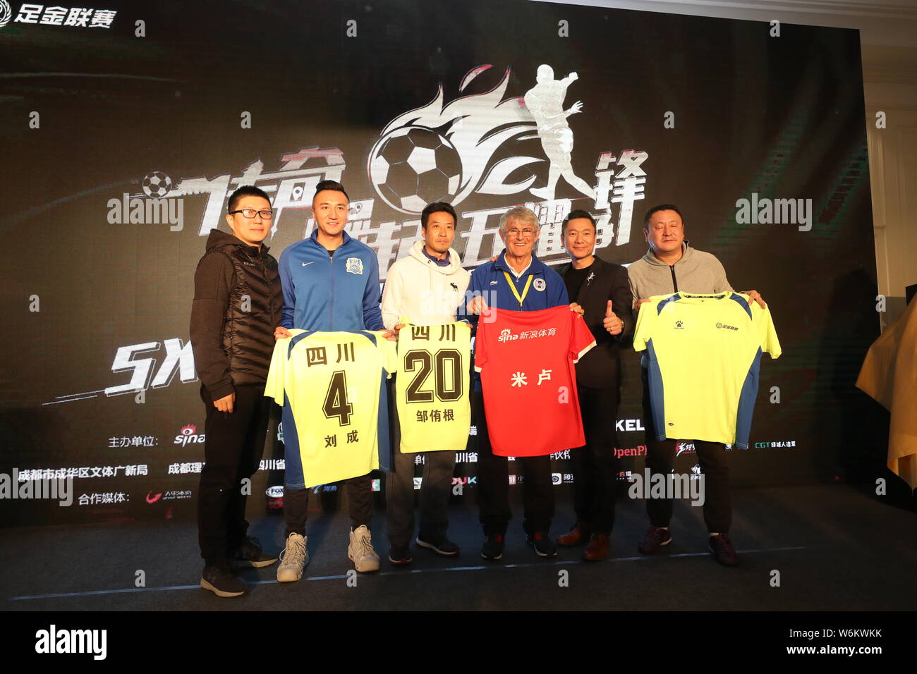 Serbian football coach and former player Bora Milutinovic, third right, attends a press conference of Sina 5v5 Football Golden League Finals in Chengd Stock Photo