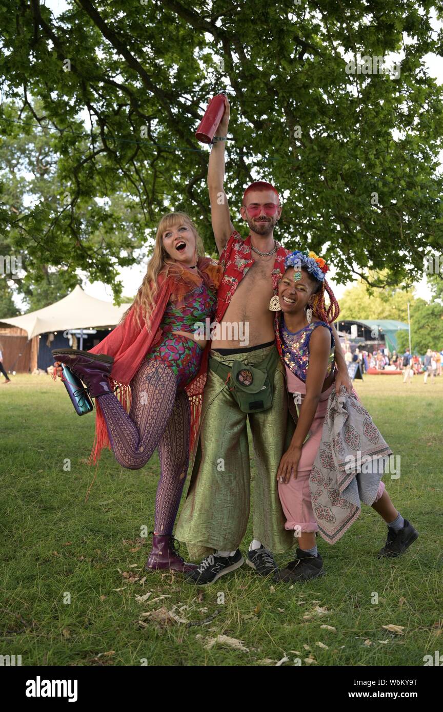 Wilderness Festival, Oxfordshire, UK. 1st August 2019. Revellers ready for a weekend of everything a festival has to offer on the first day of Wilderness. The festival, now in its 9th year, is a celebration of art, culture, food and music. Andrew Walmsley/Alamy Live News Stock Photo