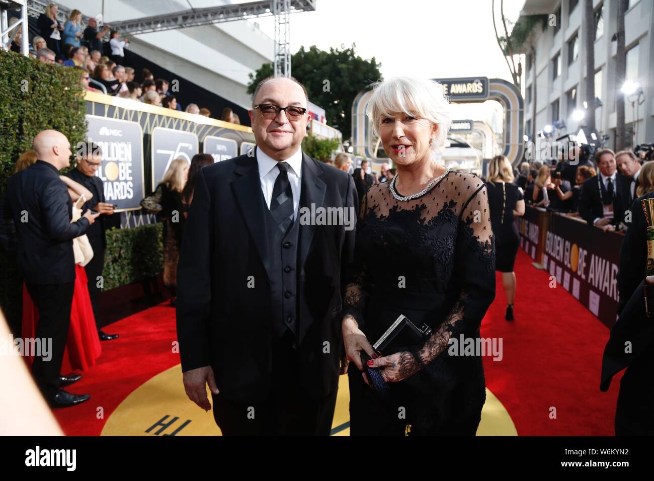 English actress Helen Mirren, right, arrives on the red carpet for the 75th Golden Globe Awards in Los Angeles, California, U.S., 7 January 2018. Stock Photo