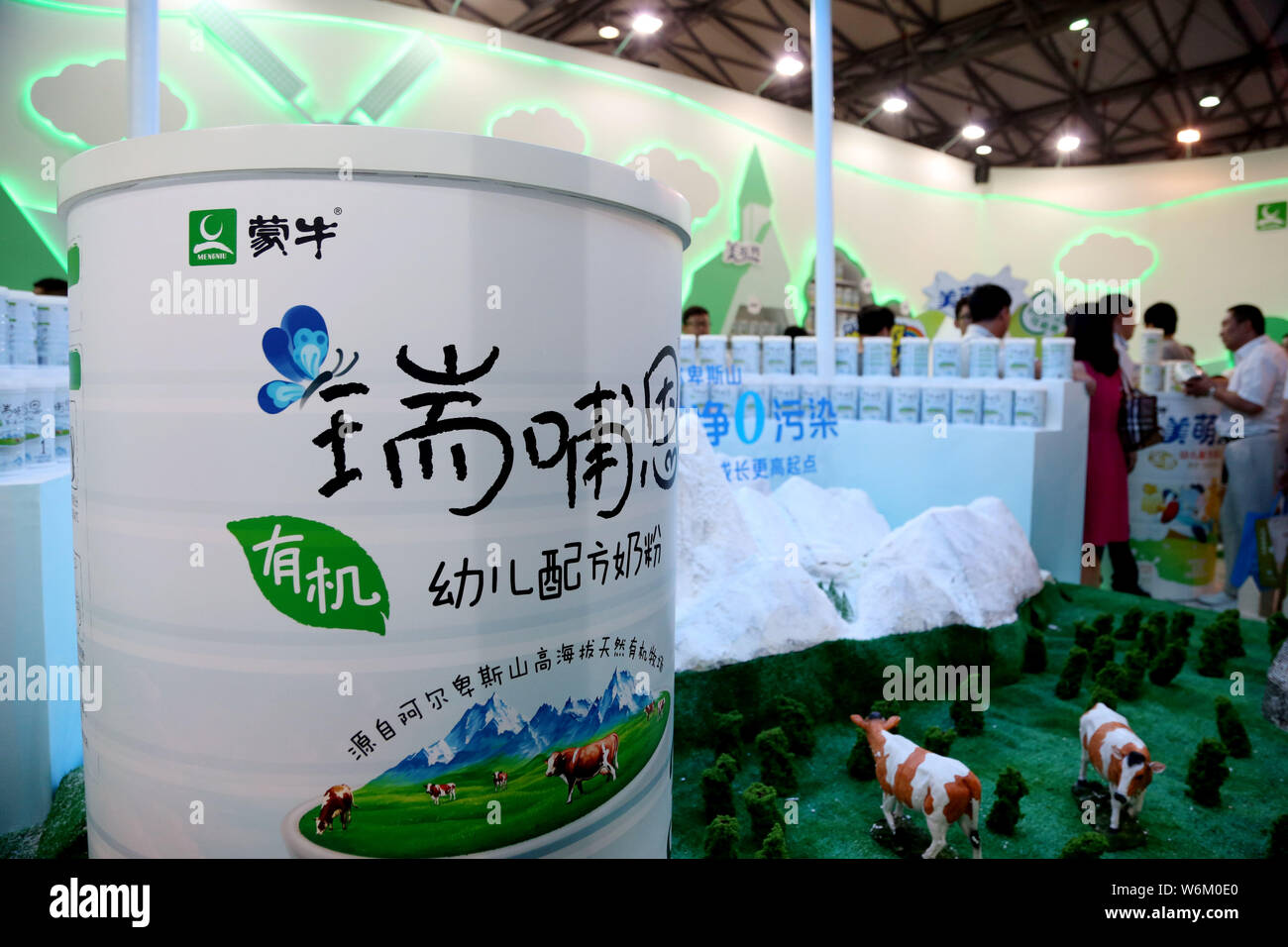 FILEPeople visit the stand of Chinese dairy giant Mengniu Dairy