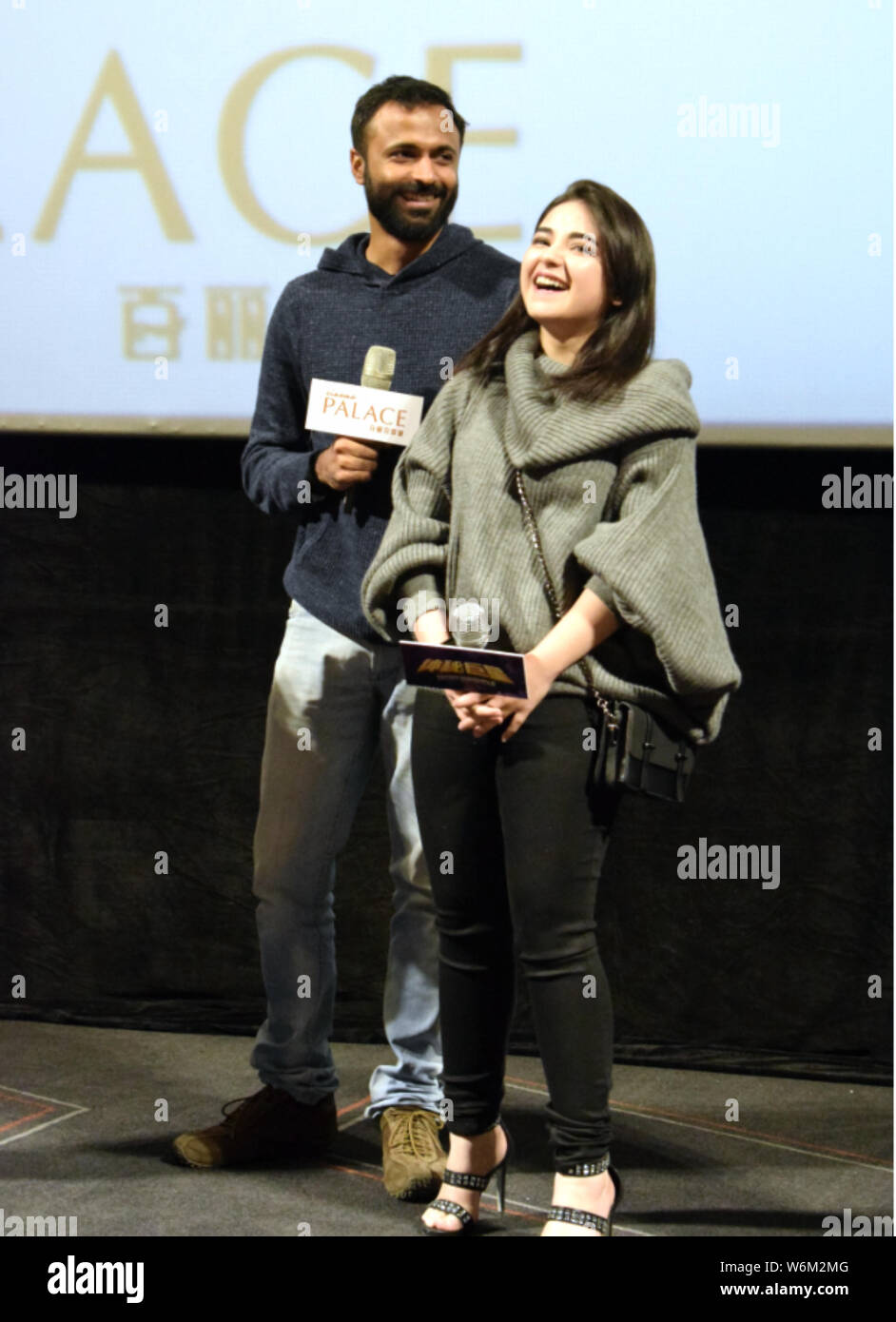 Indian director Advait Chandan, left, and film child actress Zaira Wasim attend a press conference to promote their new movie 'Secret Superstar' in Wu Stock Photo