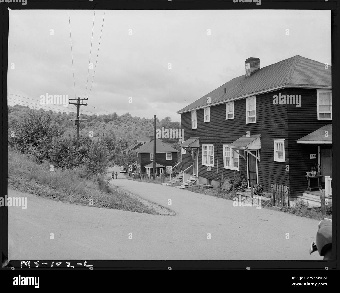 Street in company housing project. Buckeye Coal Company, Nemacolin Mine