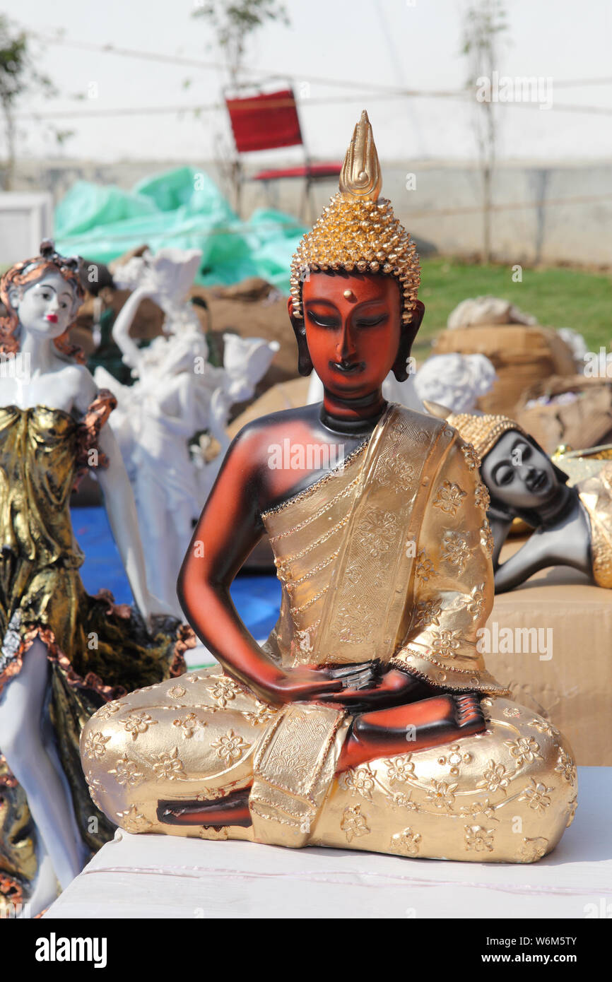 Statue of Buddha for sale at Surajkund Crafts Mela, Surajkund, Faridabad, Haryana, India Stock Photo