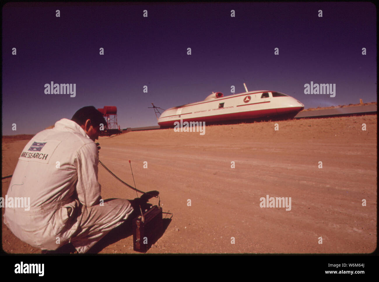 TECHNICIAN MONITORS TESTS OF THE LIMTV (LINEAR INDUCTION MOTOR TEST