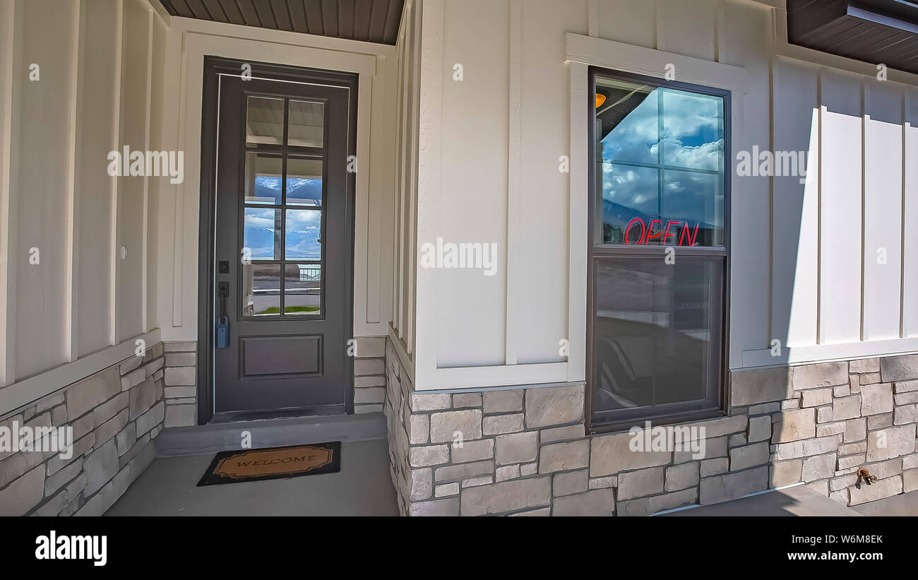 Panorama Frame Building Facade With Glass Paned Door And A