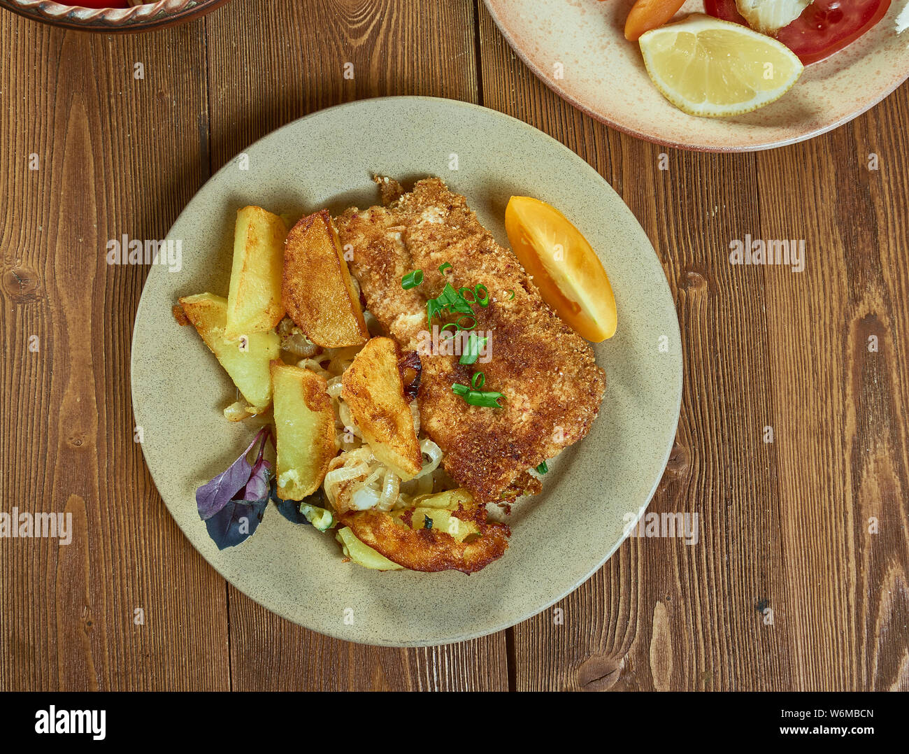 Crumbed Snapper Cajun PanFried Crumbed Fish Stock Photo Alamy