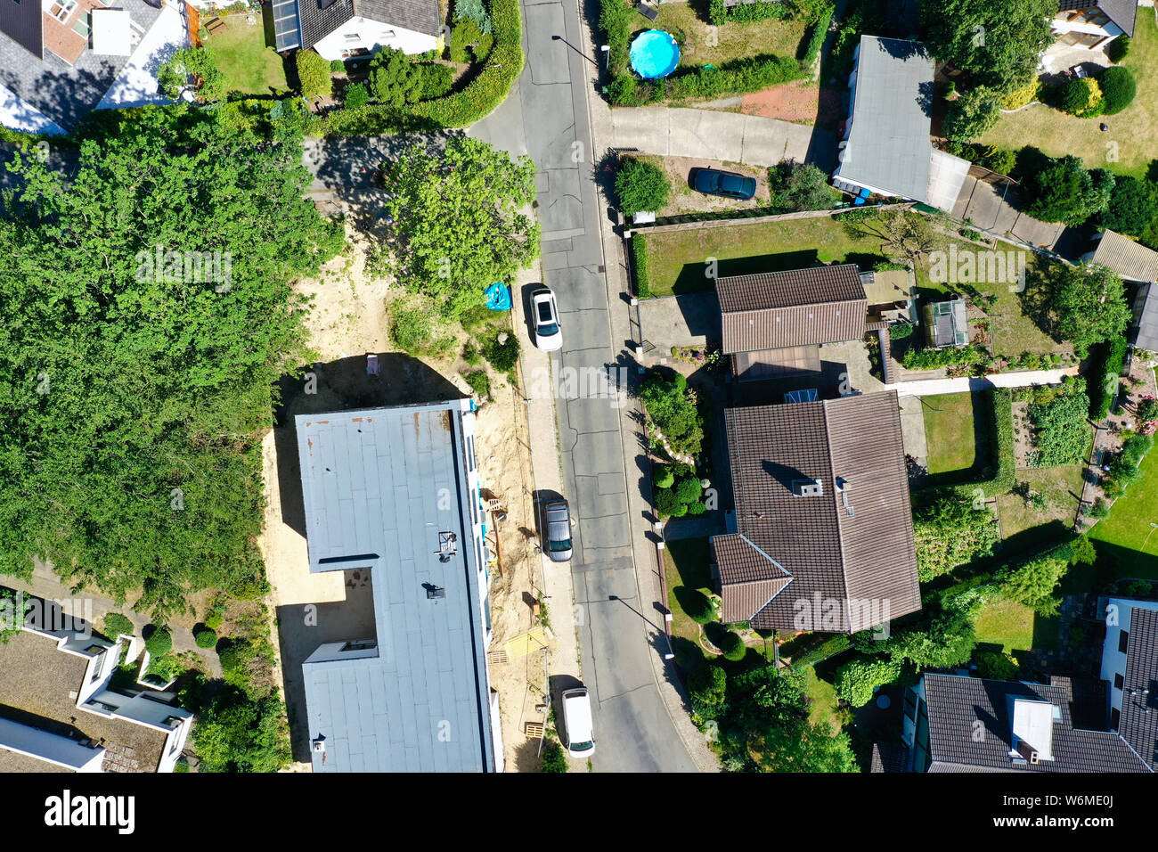 Celle, Germany, June 26.,2019: Housing estate with single-family houses, garden and lawn and neighbour, taken from a vertical perspective Stock Photo