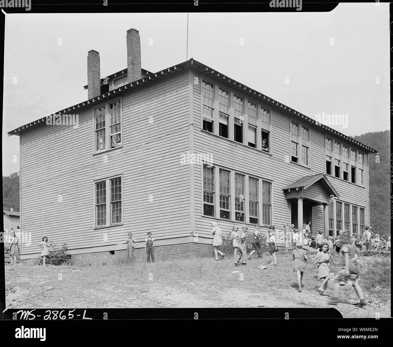 The grade school which is used by several coal camps in this vicinity. It was built with WPA funds. Lejunior, Harlan County, Kentucky. Stock Photo