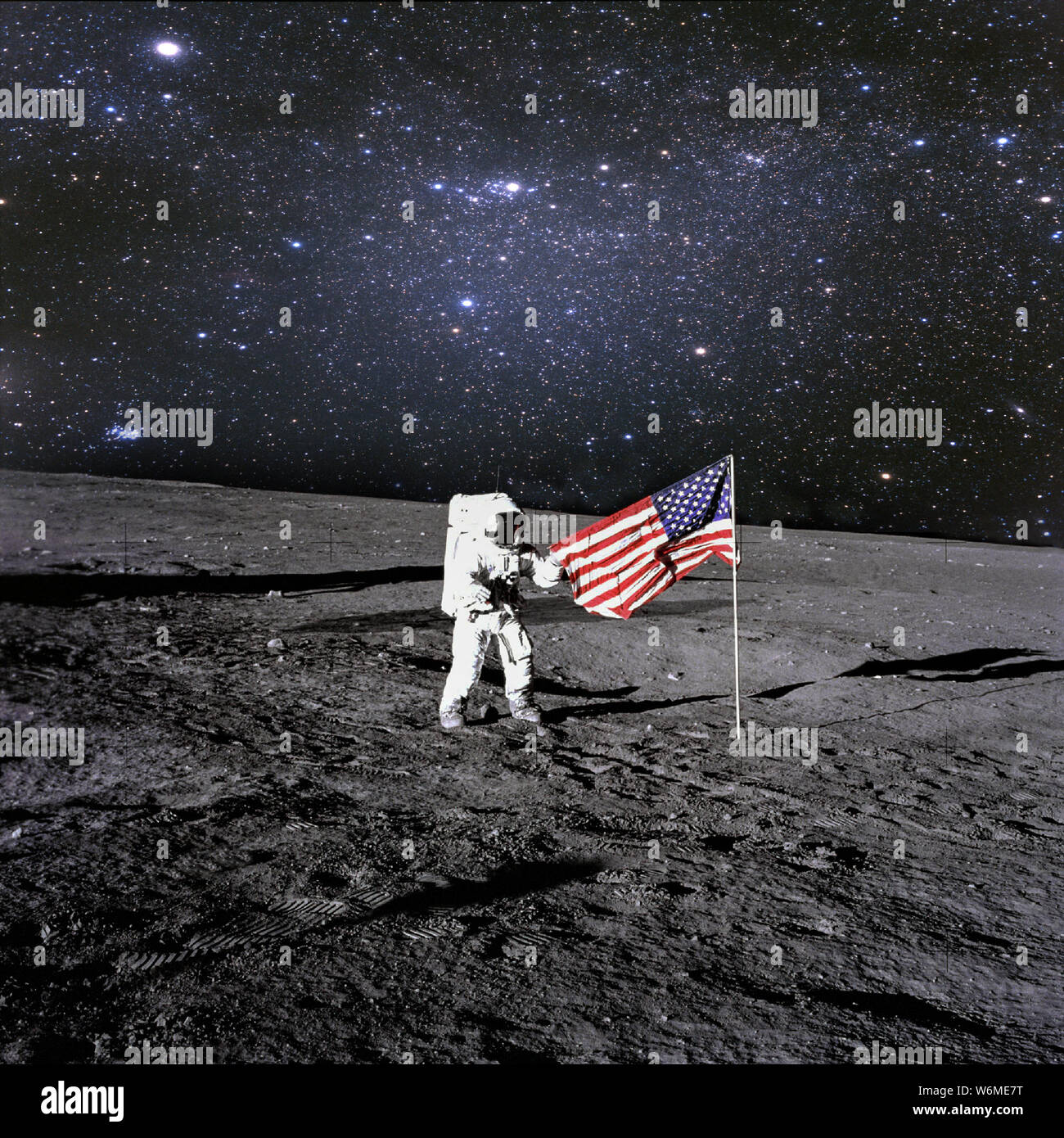American astronaut landed and set his national flag on the planet. Spaceman explore unknown planet. Elements of this image furnished by NASA Stock Photo