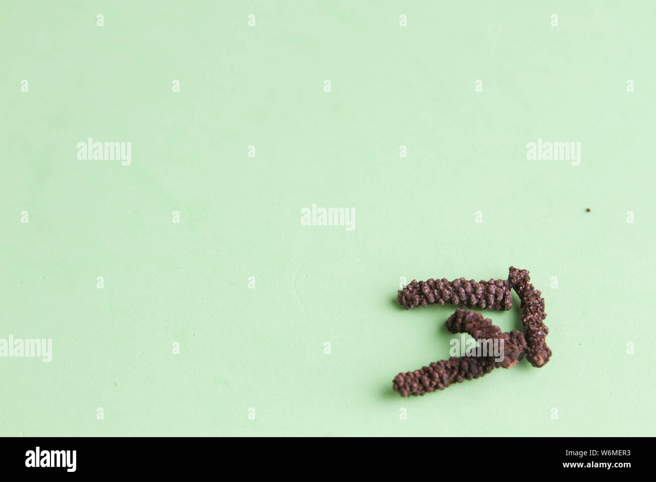 Long peppercorns for cooking and cocktails Stock Photo Alamy