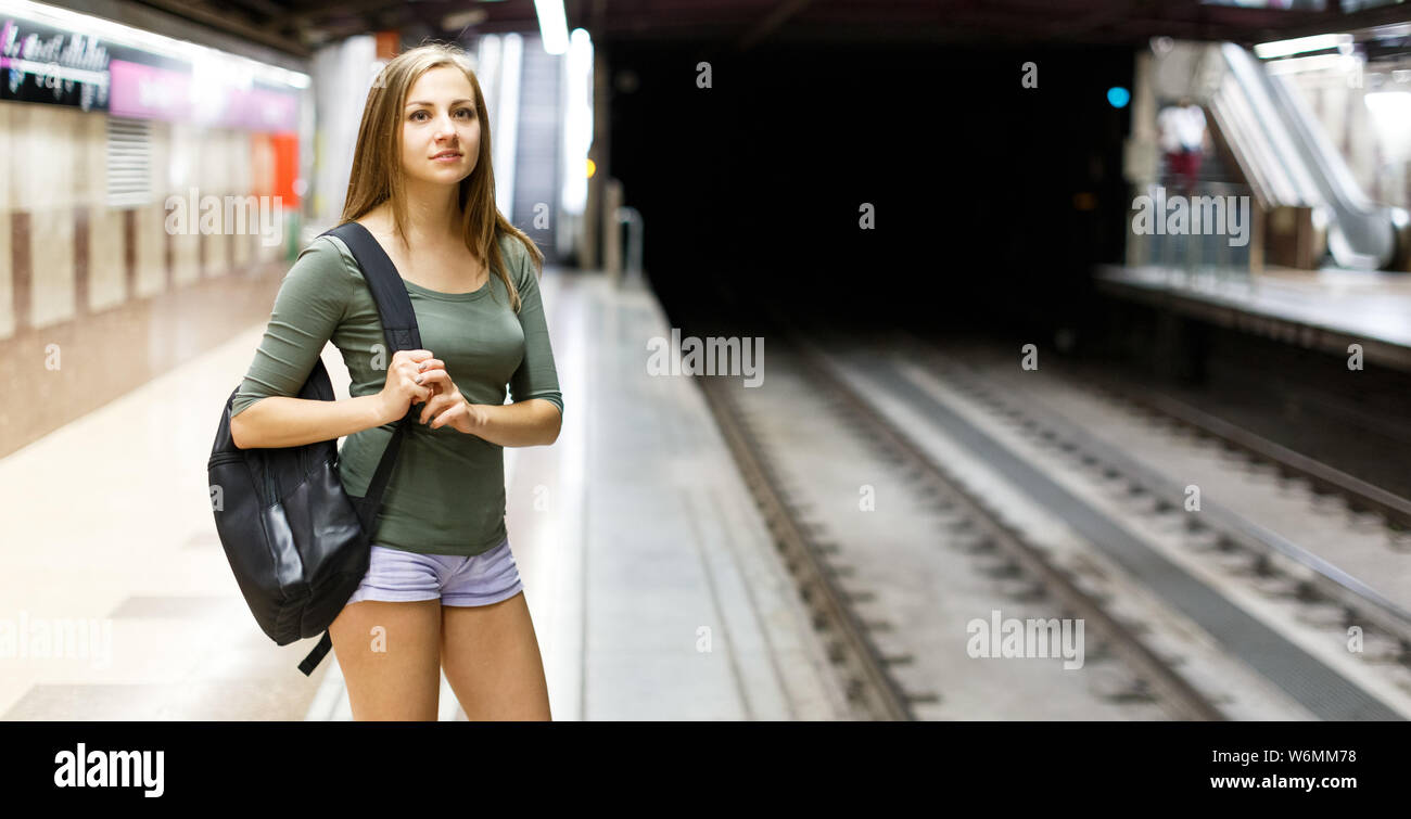Woman standing outdoor train hi-res stock photography and images - Alamy