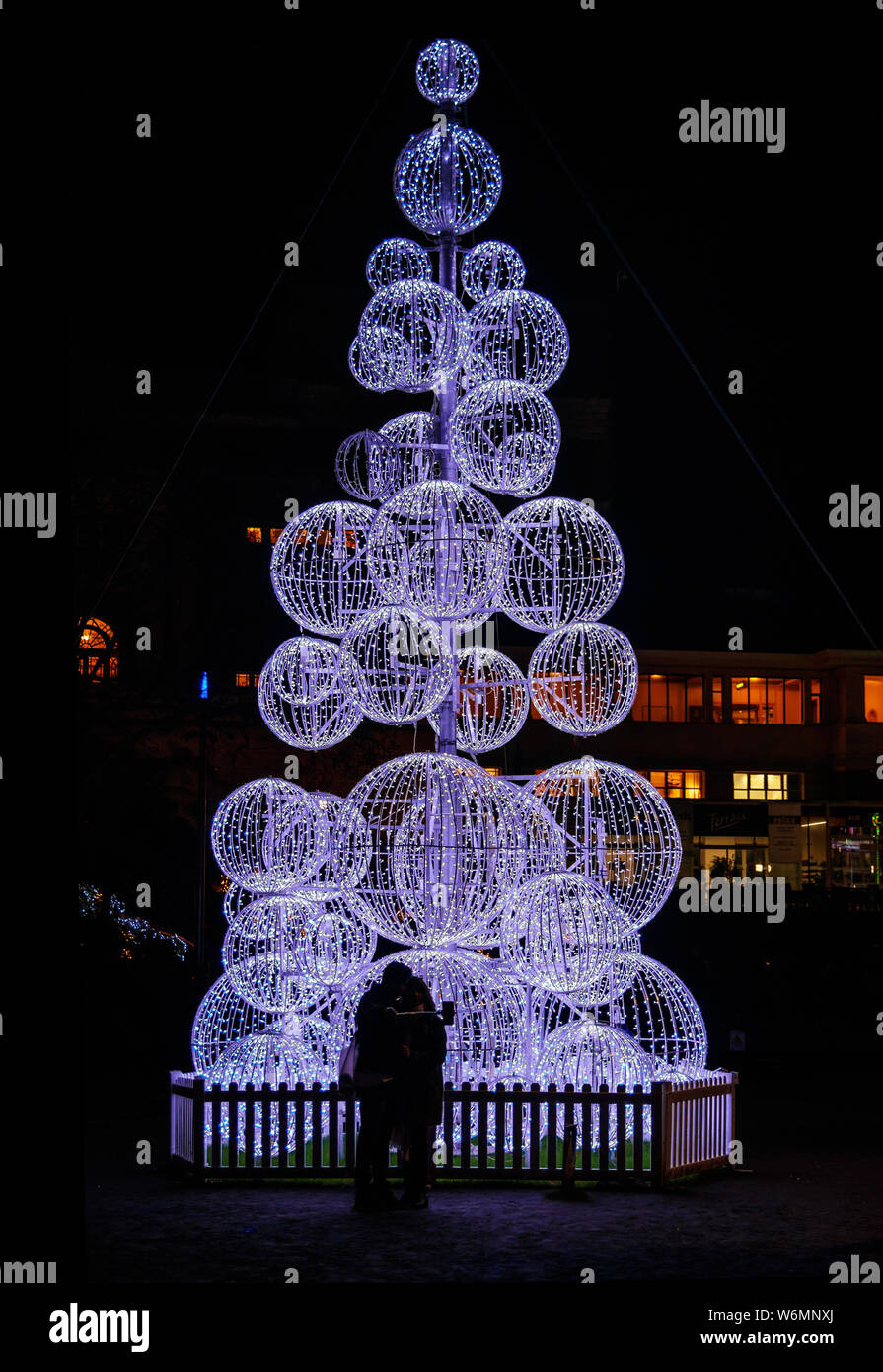 Loving couple under the Christmas Lights 2018 in the Victorian Lower